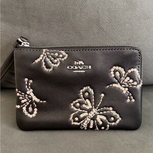 Coach Black Wristlet with Butterfly Design